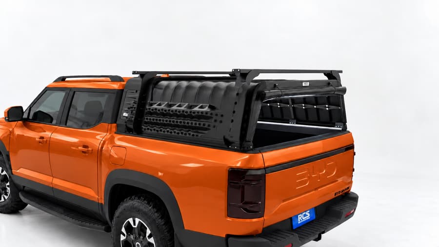 RCS canopy on a BYD Shark 6, with roof racks and MaxTrax mounts