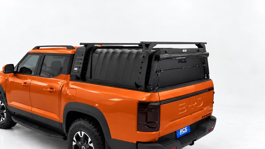 RCS canopy on a BYD Shark 6, with roof racks and security screen