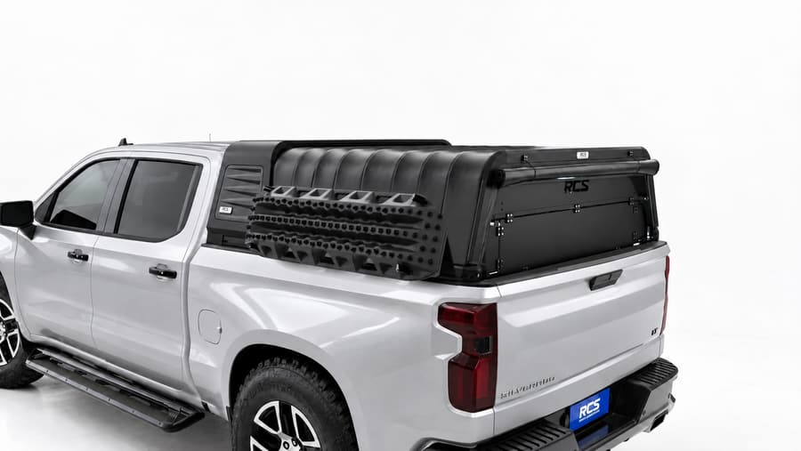 RCS canopy on a Chevrolet Silverado 1500, with security screen and MaxTrax mounts