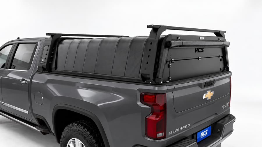 RCS canopy on a Chevrolet Silverado 2500 HD, with roof racks and security screen