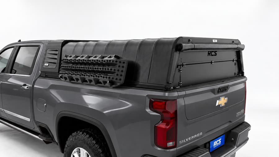 RCS canopy on a Chevrolet Silverado 2500 HD, with security screen and MaxTrax mounts