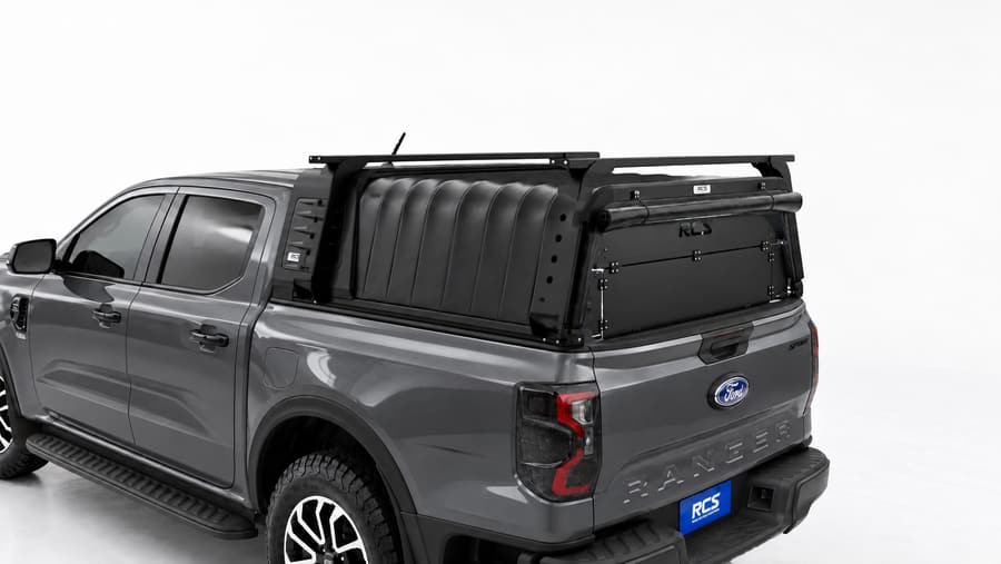 RCS canopy on a Ford Ranger, with roof racks and security screen