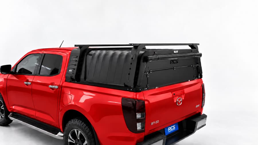 RCS canopy on a Mazda BT-50, with roof racks and security screen