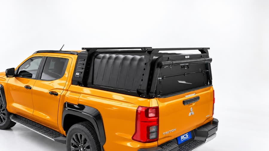 RCS canopy on a Mitsubishi Triton, with roof racks and security screen