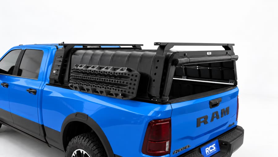 RCS canopy on a RAM 2500, with roof racks and MaxTrax mounts