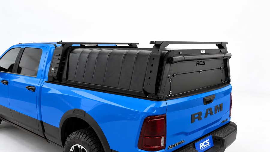 RCS canopy on a RAM 2500, with roof racks and security screen