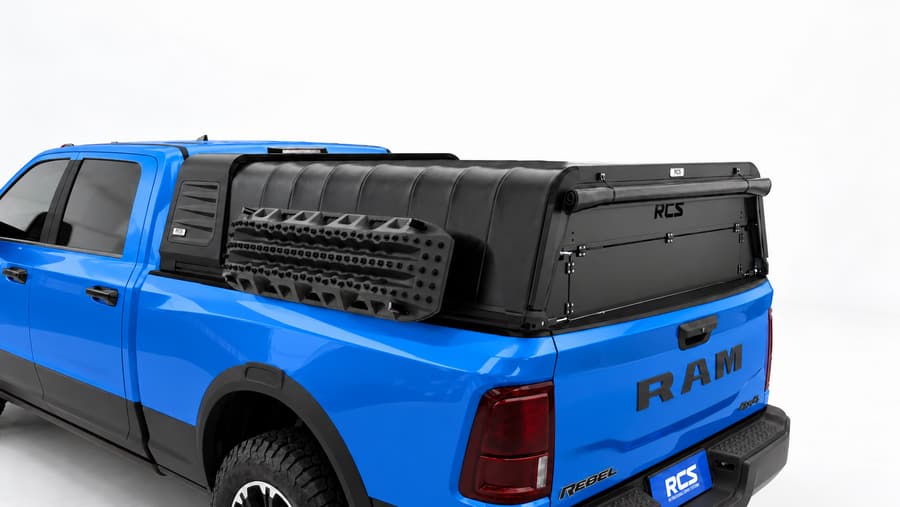 RCS canopy on a RAM 2500, with security screen and MaxTrax mounts