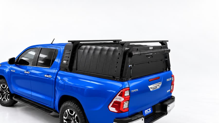 RCS canopy on a Toyota HiLux, with roof racks and security screen