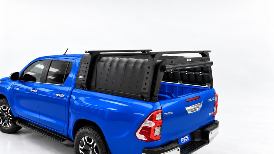 RCS canopy on a Toyota HiLux, with roof racks