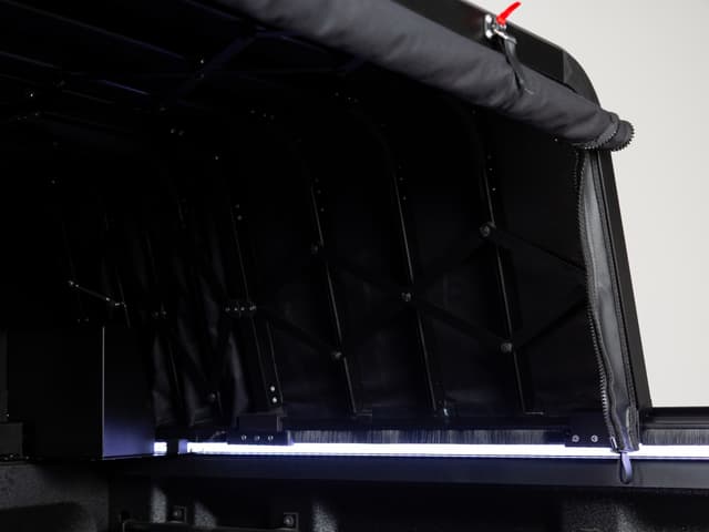 Inside the canopy showing the scissor frame and the LED strip