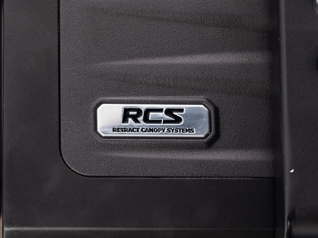 The hard shell headboard with the RCS badge