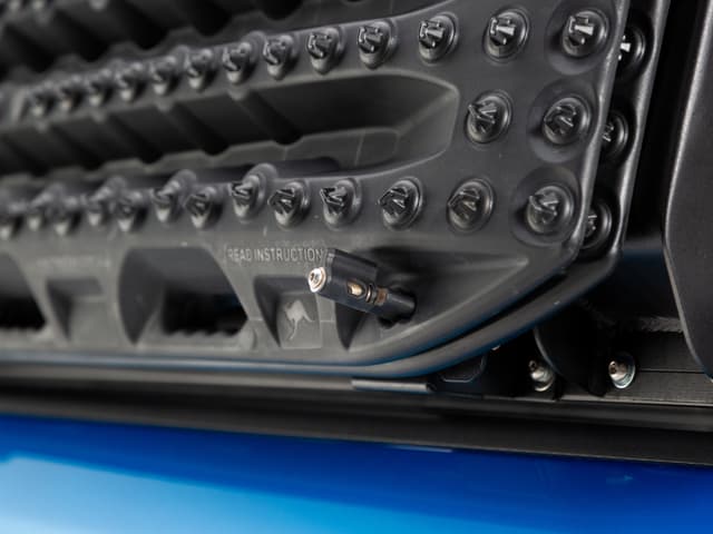A recovery board on the quick-pin mount beside the headboard