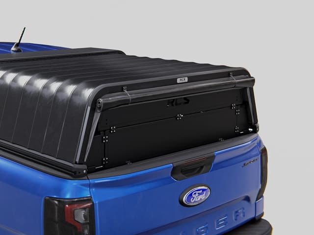 The lockable aluminium security screen folded down across the back of the canopy