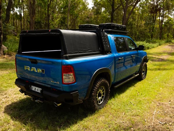 The RCS canopy closed on a blue RAM 1500, from behind