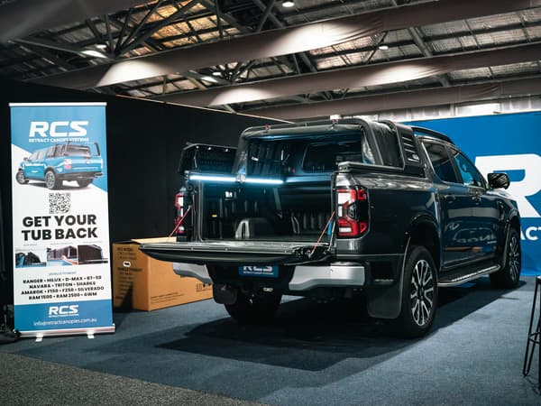 The RCS canopy open on a Ford Ranger on the show stand