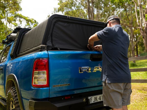 Closing the RCS canopy cover on a RAM 1500 by hand