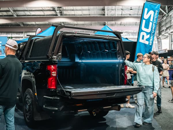 The RCS canopy open on a Silverado at a 4x4 show